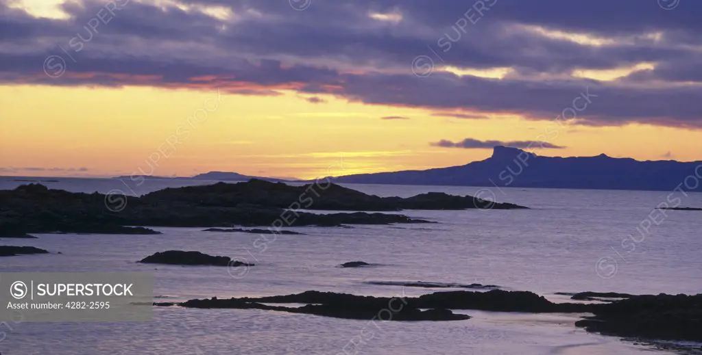 Scotland, Highland, Loch Ailort. A sunset over the islands of Rhum and Eigg.