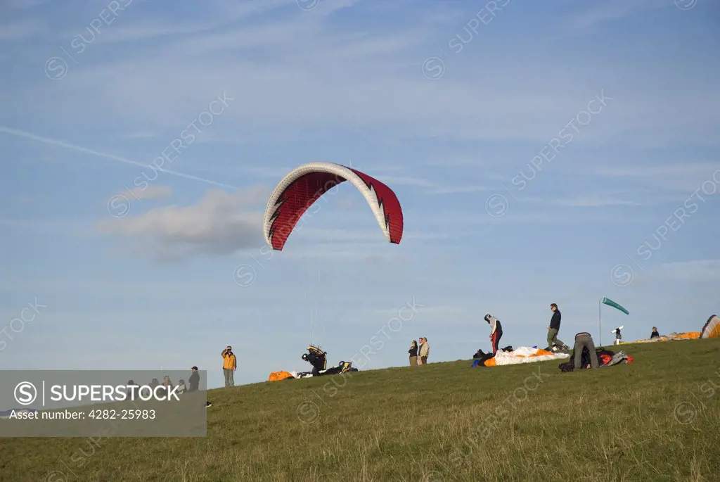 England, West Sussex, Devil's Dyke. Paragliders preparing to fly on Devil's Dyke.