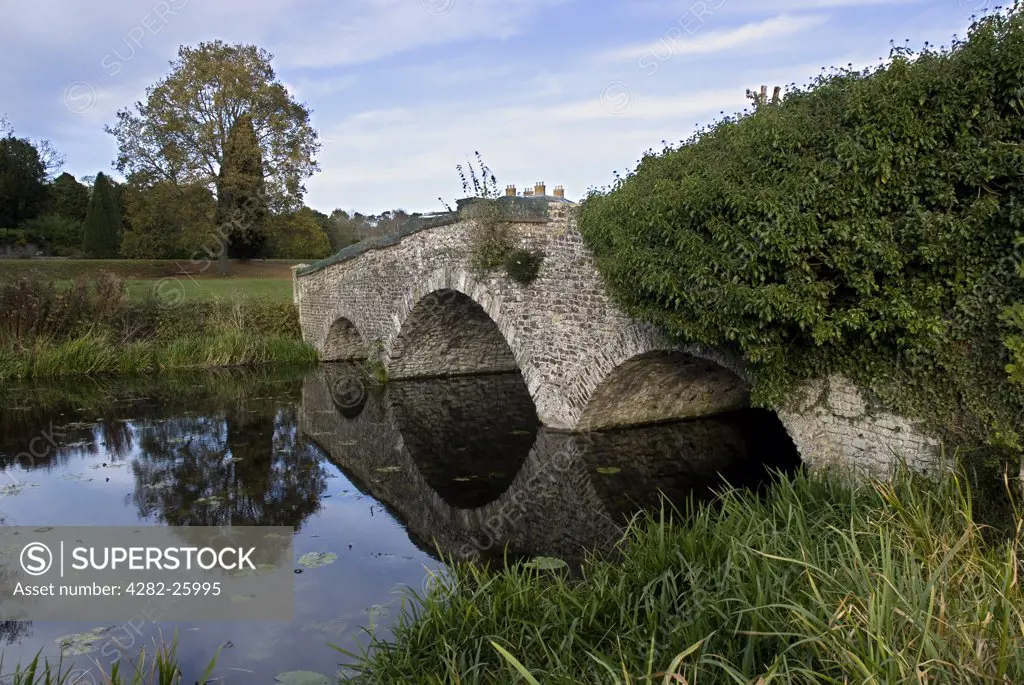 England, Surrey, Waverley Abbey. The bridge over the River Wey connecting Waverley Abbey and Waverley Abbey House.