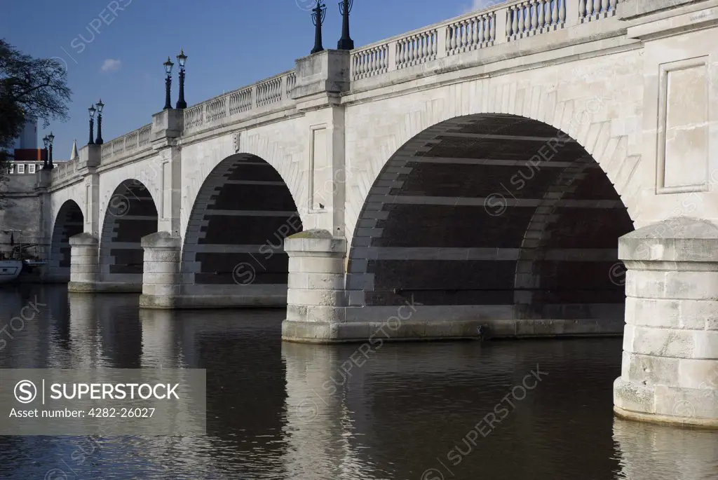 England, London, Kingston upon Thames. Arches of Kingston Bridge spanning the River Thames.