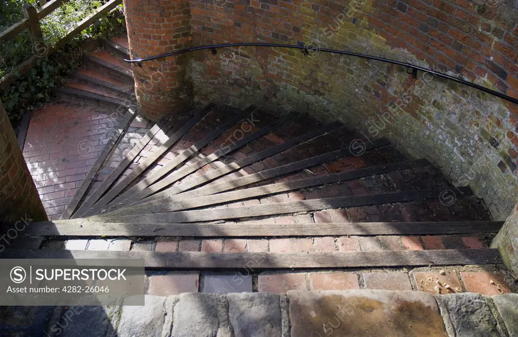 England, Surrey, Farnham. Spiral steps leading to Farnham castle. Nearly continuos occupancy over the last 800 years have made the castle one of the most important historical buildings in the south of England.