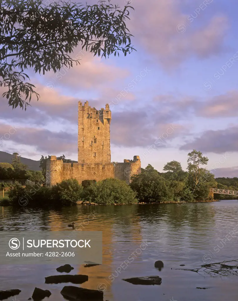 Republic of Ireland, County Kerry, Killarney. A view across the water to Ross Castle.