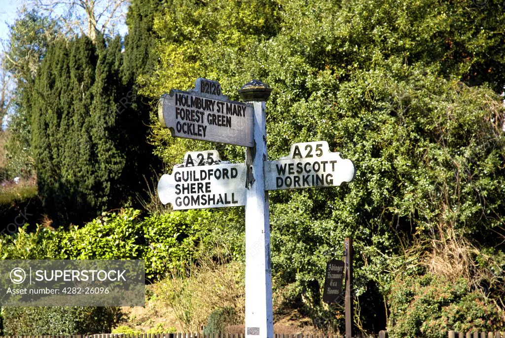 England, Surrey, Abinger Hammer. An old road sign at crossroads in Abinger Hammer.