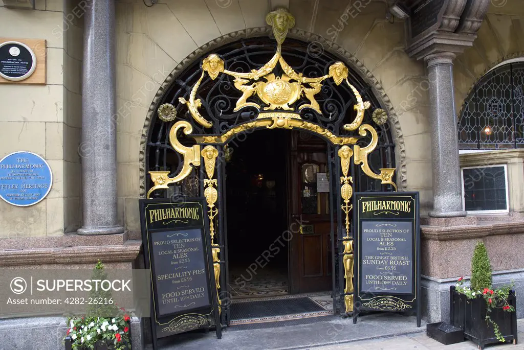 England, Merseyside, Liverpool. The entrance to The Philharmonic Dining Rooms opposite the Liverpool Philharmonic Hall.