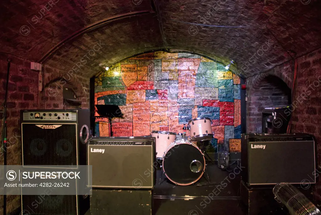 England, Merseyside, Liverpool. The stage inside The Cavern Club in Mathew Street, the venue where Brian Epstein first saw The Beatles perform in 1961.
