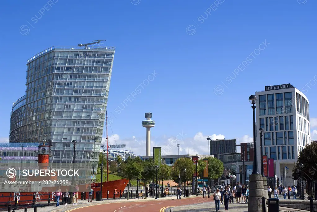 England, Merseyside, Liverpool. A mixture of old and new landmarks in Liverpool featuring the former Mersey Bar Lightship 'Planet' in Canning Dock, One Park West, Radio City Tower and the Liverpool Hilton hotel.
