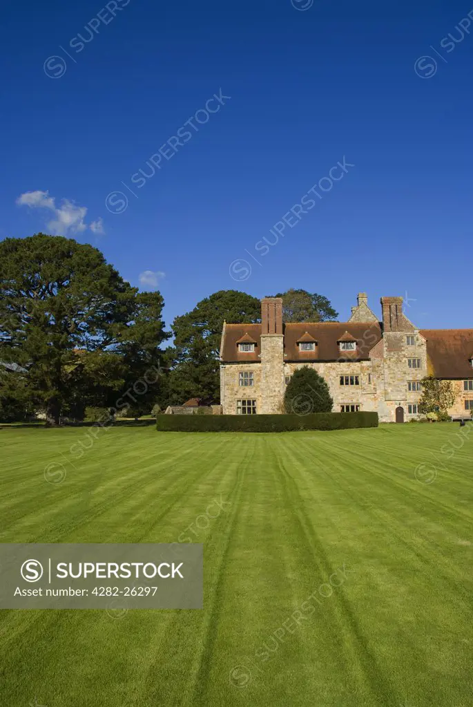 England, East Sussex, Upper Dicker, near Hailsham. Michelham Priory and Gardens, a tudor mansion that evolved from a former Augustinian Priory.