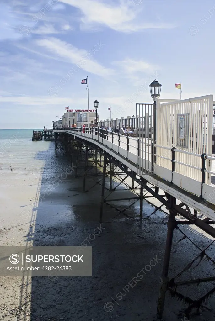 England, West Sussex, Worthing. Worthing Pier, a grade II listed building originally designed by Sir Robert Rawlinson and opened as a 960ft simple promenade deck in 1862.