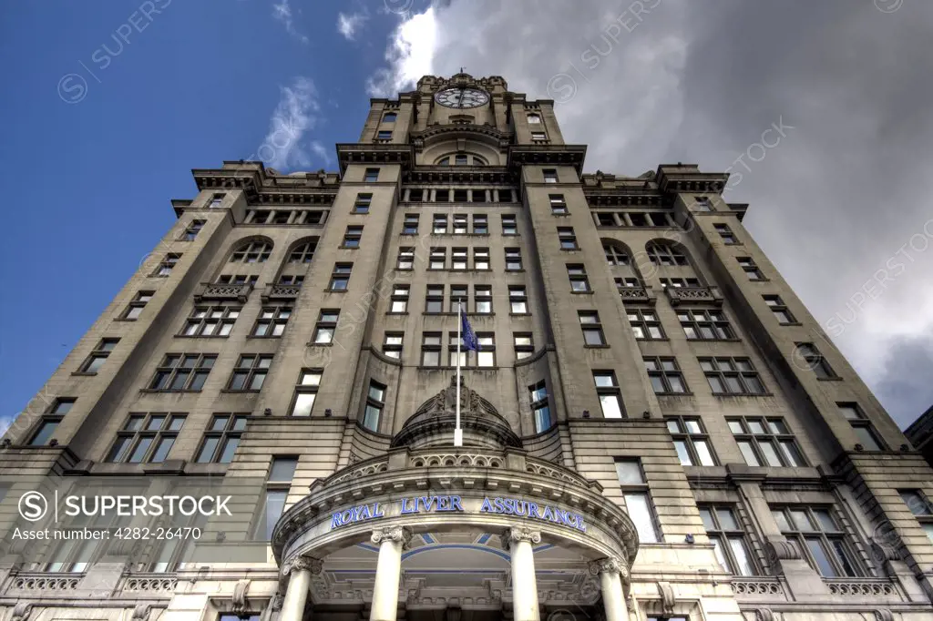 England, Merseyside, Liverpool. The Royal Liver Building following a storm. The building is one of the Three Graces found at Liverpool Pier Head.