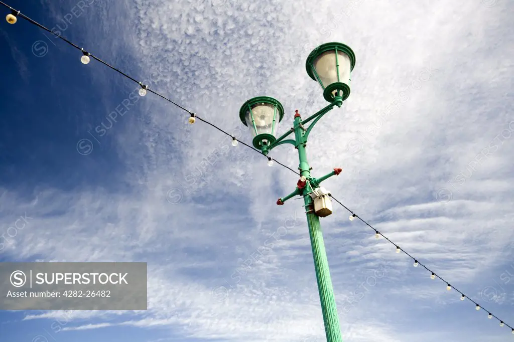 England, Lancashire, Blackpool. Lamp post and light on the North Pier at Blackpool.