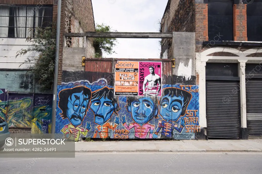 England, Merseyside, Liverpool. Graffiti depicting the Beatles. John Lennon, George Harrison, Ringo Starr and Paul McCartney.