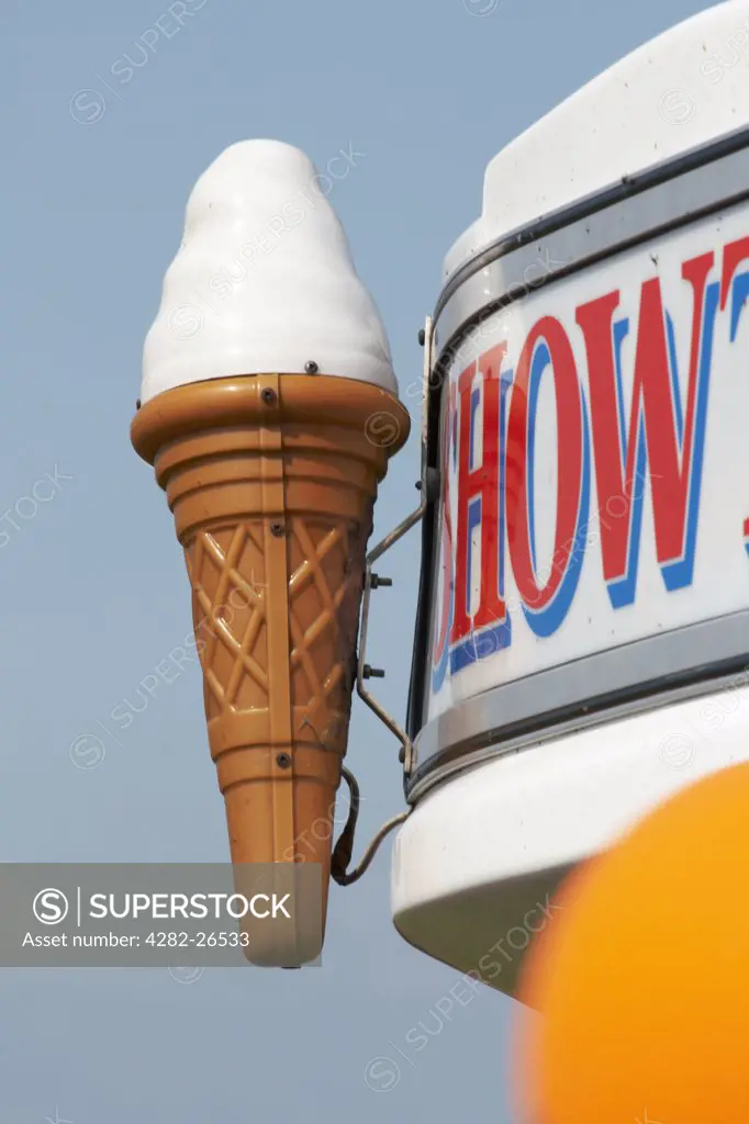 England, Lancashire, Morecambe. A large distinctive cone sign on the front of an ice cream van in Morecambe.