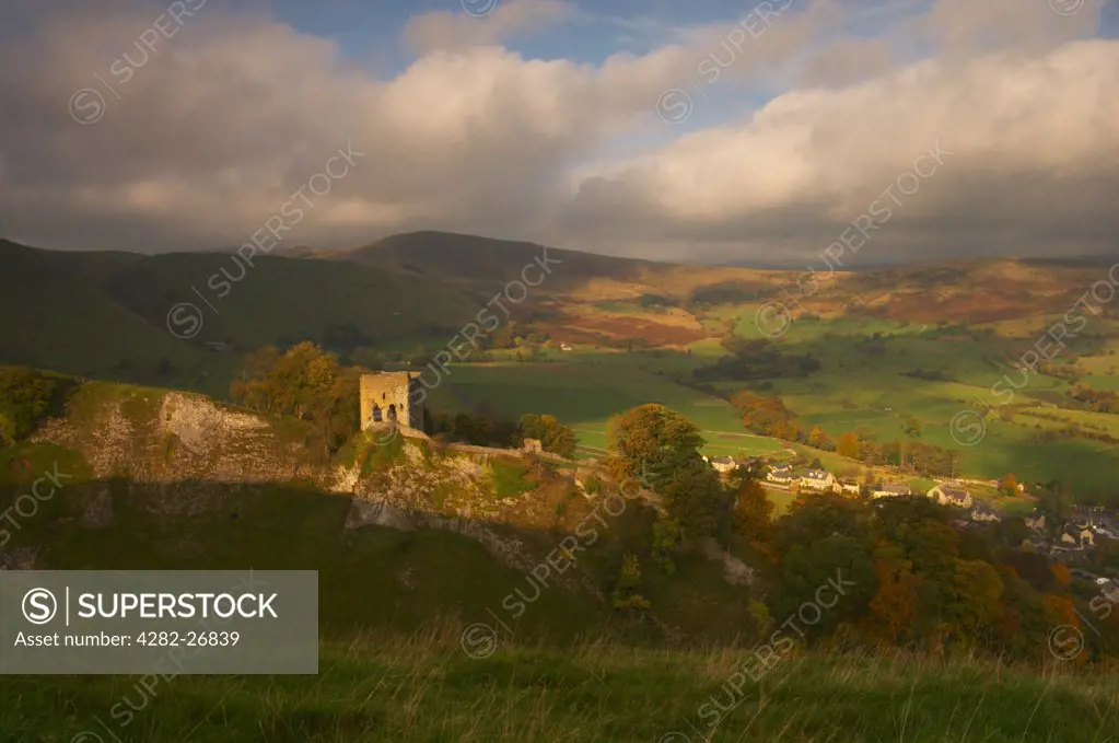 England, Derbyshire, Castleton. The remains of Peveril Castle. The slopes of Mam Tor and Winnats Pass make up the backdrop.