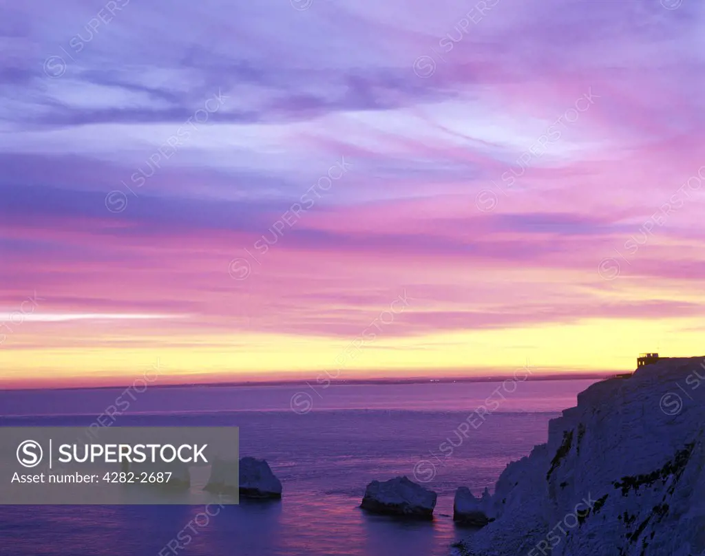 England, Isle of Wight, The Needles. Sunset over the Needles.