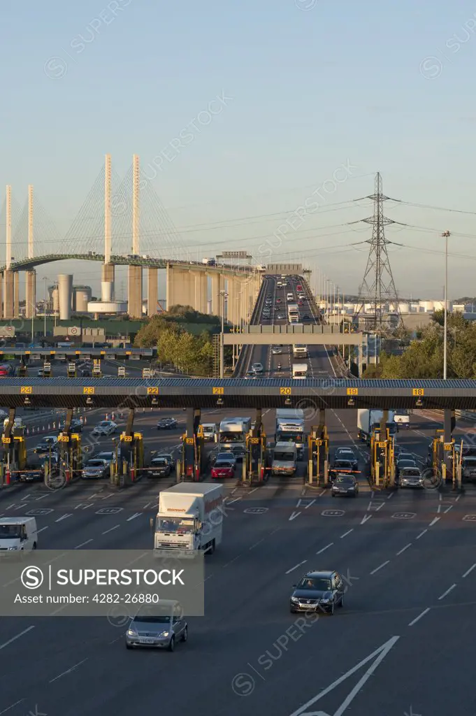 England, Kent, Dartford. Traffic pulling away from the toll booths of the Dartford River crossing to enter Kent.