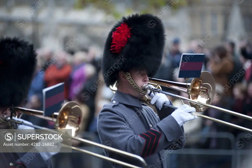 England, London, Whitehall. Military band marches through Whitehall as part of the Remembrance Day Parade.