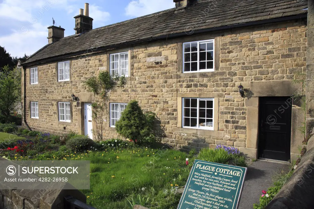 England, Derbyshire, Eyam. A row of plague cottages in the Peak District National Park.