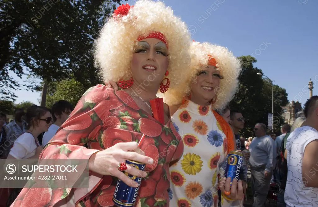 England, Sussex, Brighton. Two men dressed up at Brighton Pride. Brighton Pride is the Gay Pride event held every year in the south coast city.