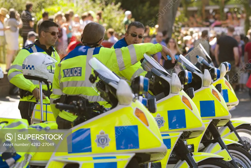England, East Sussex, Brighton. Police at Brighton Pride oversee the Gay Pride festival held annually in Brighton.