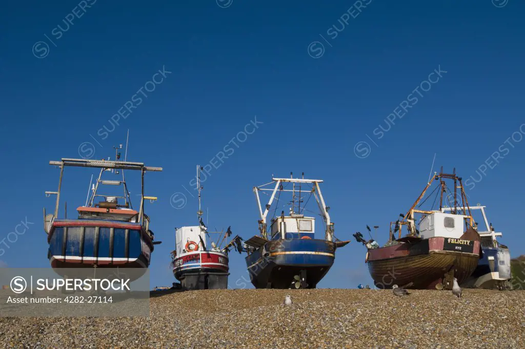 England, East Sussex, Hastings. Fishing boats on the beach at Hastings on the East Sussex coast.