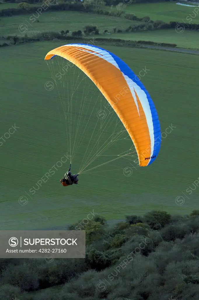 England, West Sussex, Devil's Dyke. Paragliding over the South Downs.