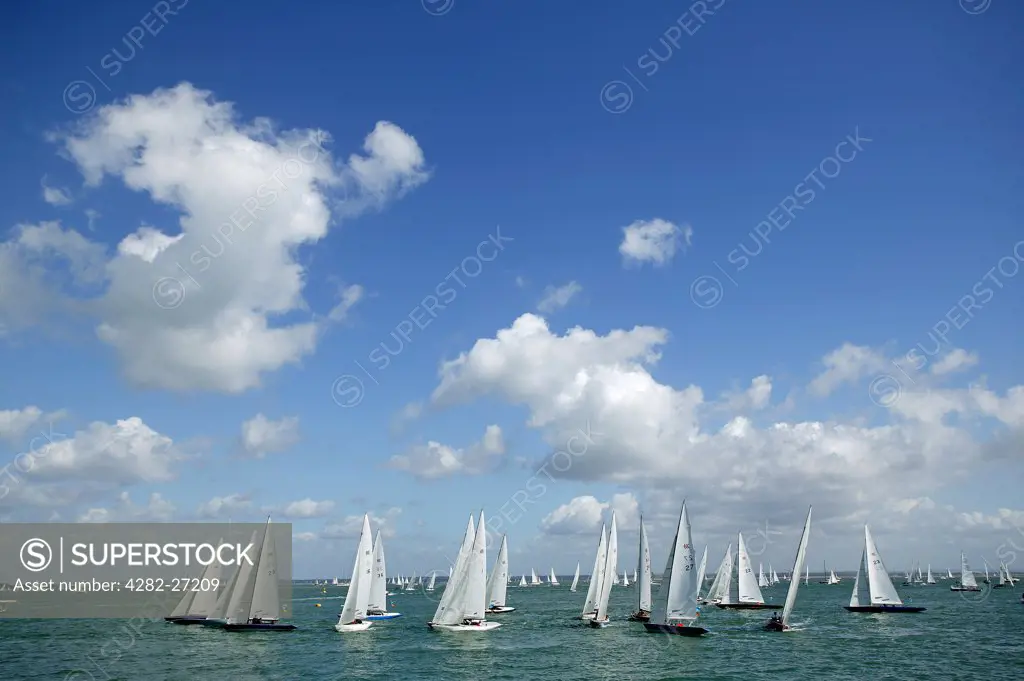 England, Isle of Wight, Cowes. Yachts racing during Cowes Week.