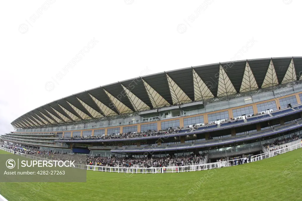 England, Berkshire, Ascot. Crowds in the stands at Pre Opening day of the Ascot Races.