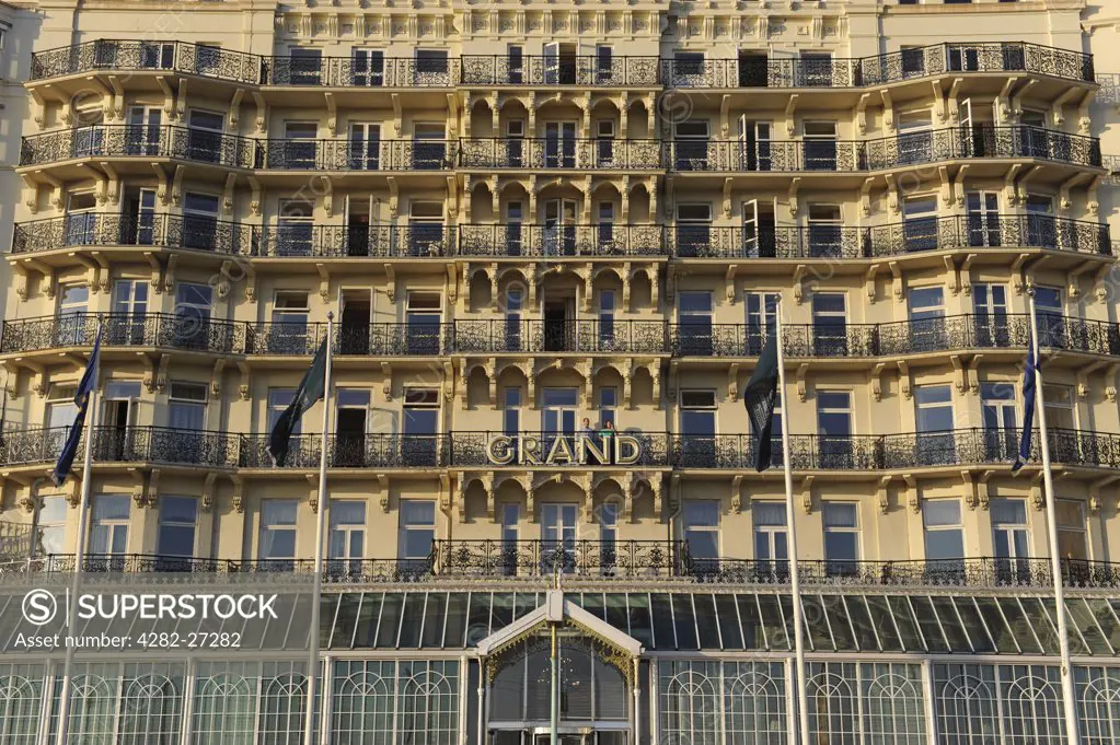 England, East Sussex, Brighton. An exterior view of the Grand Hotel on the seafront in Brighton.