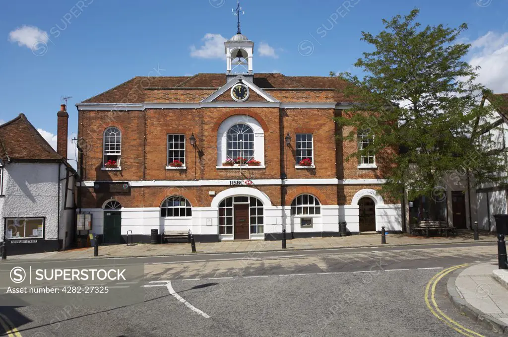 England, Hampshire, Whitchurch. The 18th century Town Hall and bell tower in Whitchurch. The building houses the lowest ATM cash machine in Britain at 18 inches above the ground.