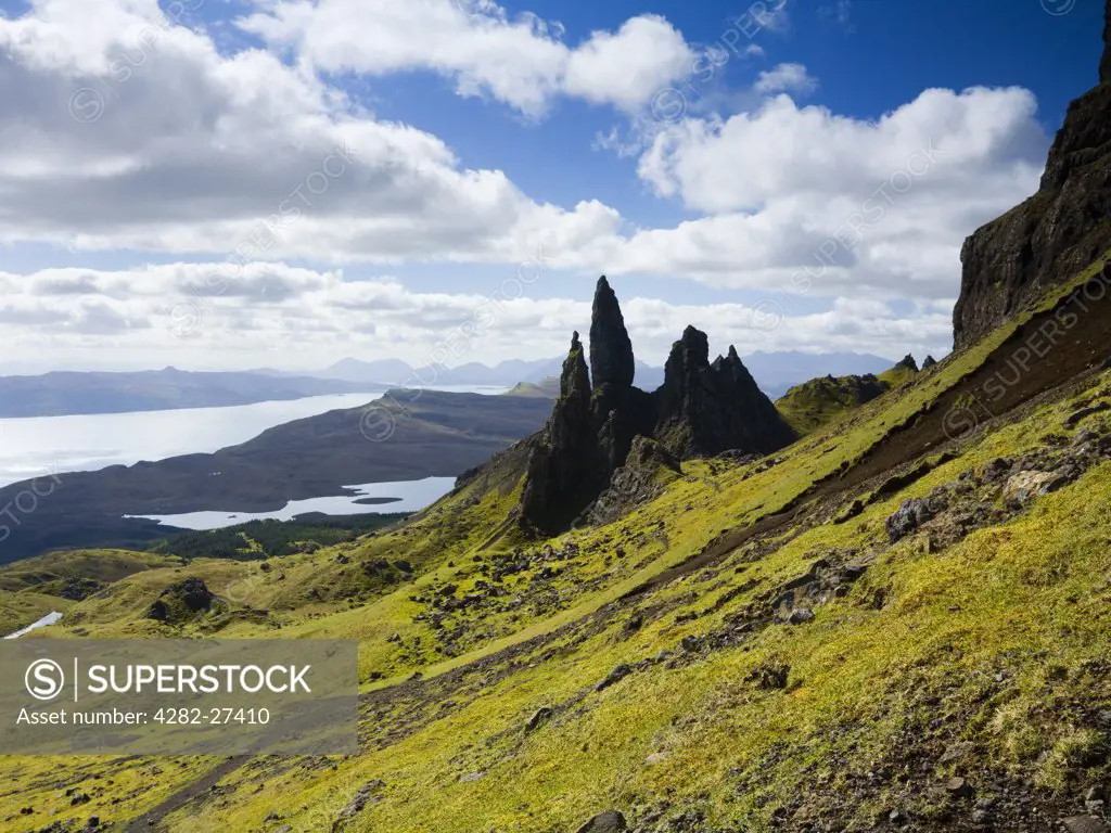 Scotland, Highland, Isle of Skye. The Old Man of Storr, an unusual rock formation formed by a prehistoric land slide and erosion, on the Trotternish peninsula.