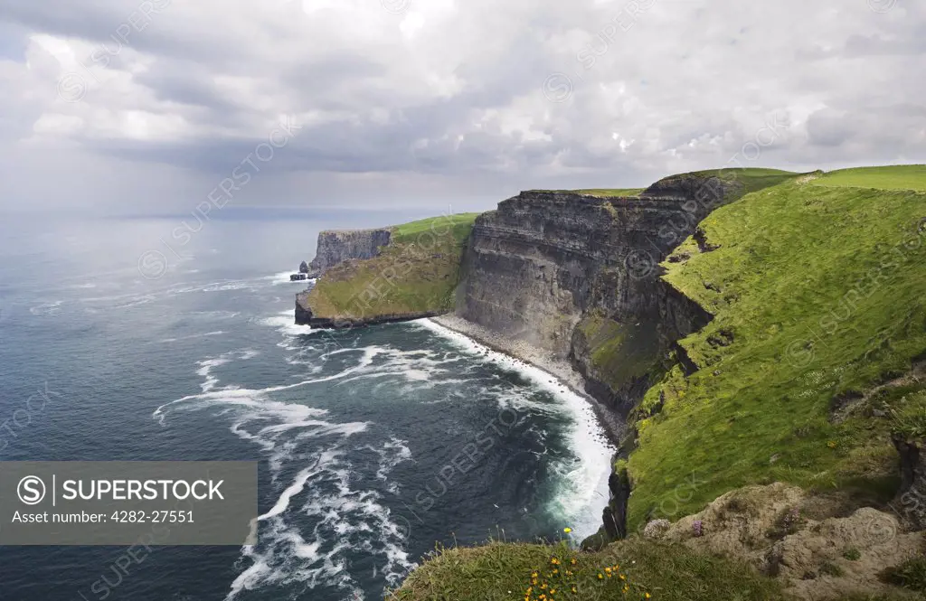 Republic of Ireland, County Clare, Cliffs of Moher. The Cliffs of Moher that stretch for 8 km & rise up to 214 metres above the Atlantic Ocean.