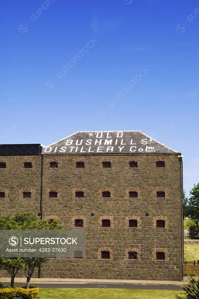 Northern Ireland, County Antrim, Bushmills. Old Bushmills' Distillery Co Ltd founded in 1608. Bushmills whiskey is still produced, matured and bottled at the site.