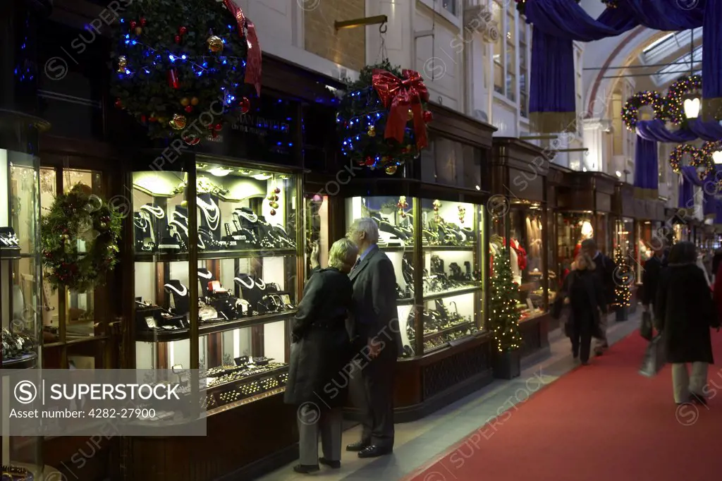 England, London, Piccadilly. Christmas shopping in the Burlington Arcade.