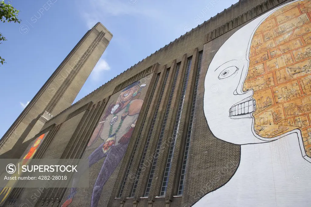 England, London, South Bank. Graffitti art on the exterior of Tate Modern.