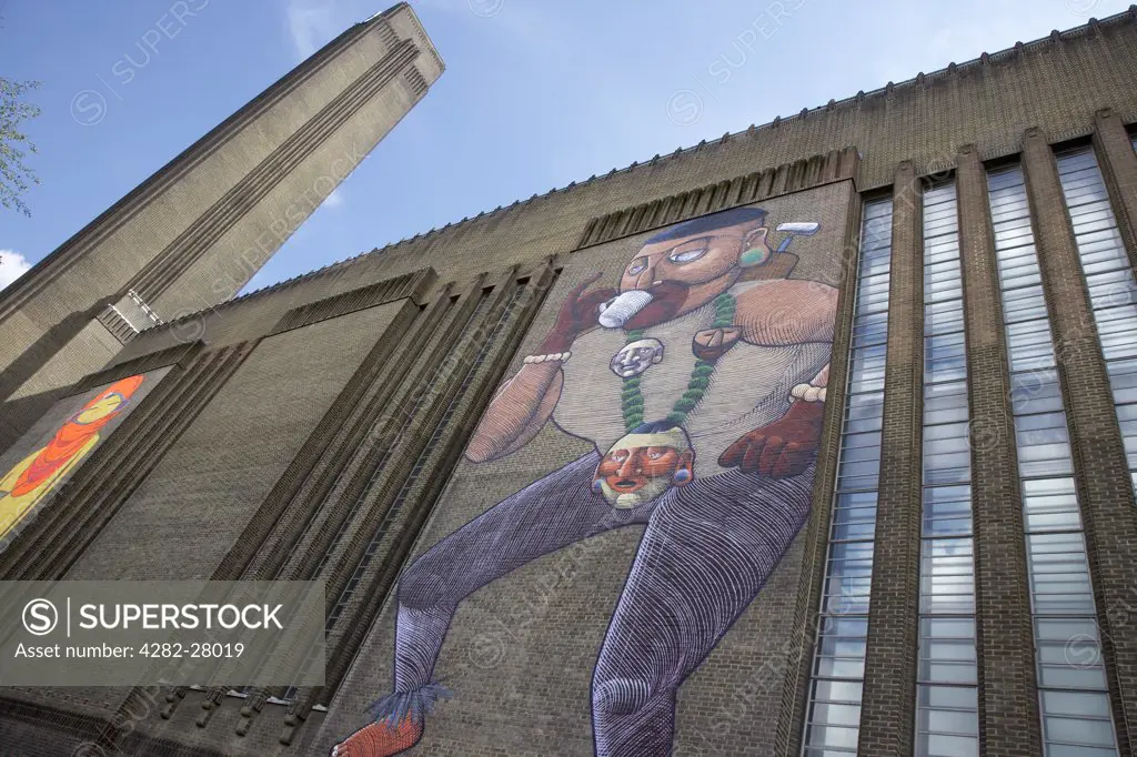 England, London, South Bank. Graffitti art on the exterior of Tate Modern.