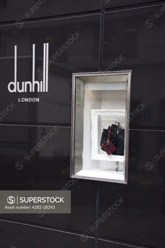 England, London, City of Westminster. A display window in the wall of Dunhill London in the City of Westminster.