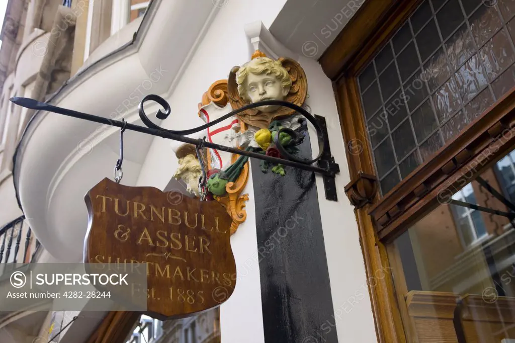 England, London, City of Westminster. Looking up to the Turnbull and Asser shirtmakers shop sign in the City of Westminster.