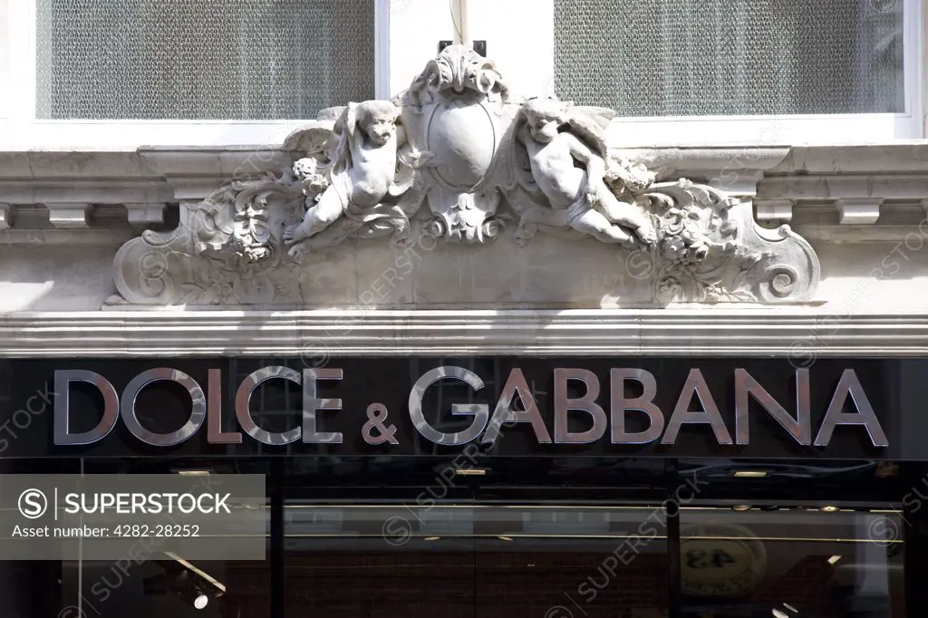 England, London, Old Bond Street. The traditional shop front and signage of Dolce and Gabbana in Old Bond Street.