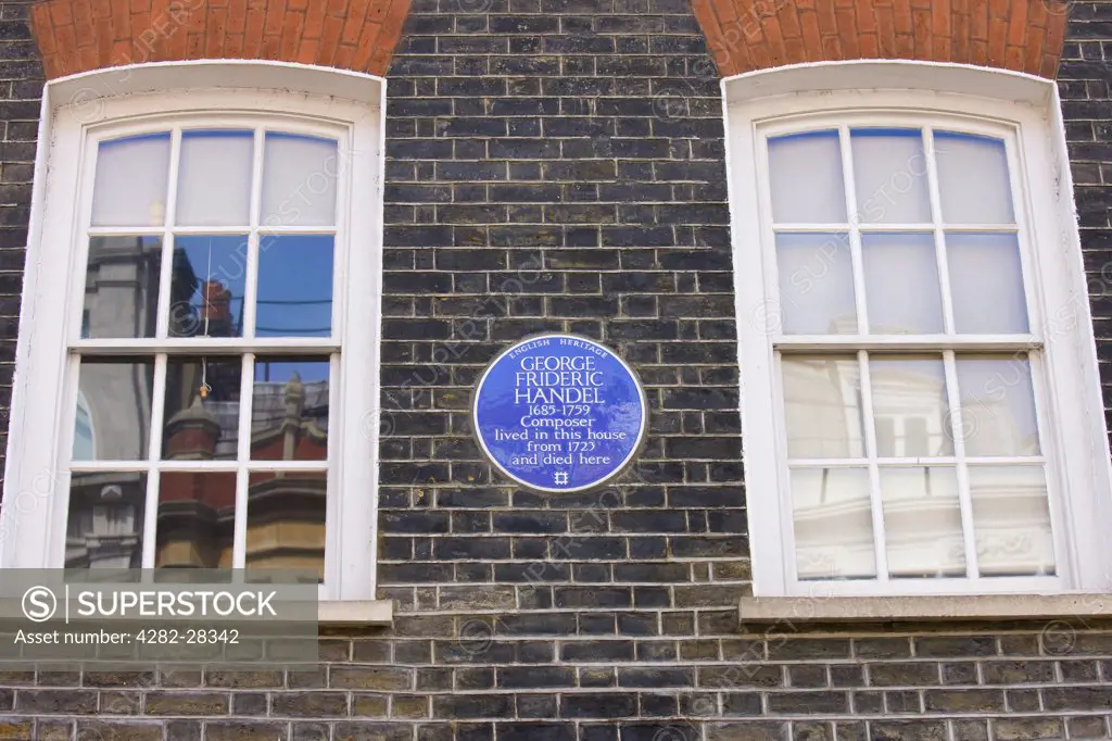 England, London, West End. A blue English Heritage plaque on the wall of a house to celebrate that the composer George Frideric Handel 1685 -1759 lived there from 1723.