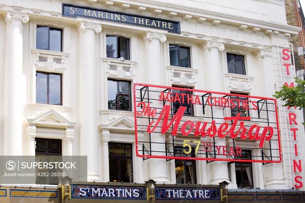 England, London, West End. The front of St Martins Theatre bearing a sign advertising Agatha Christie's 'The Mousetrap' in its 57th year is currently playing there.