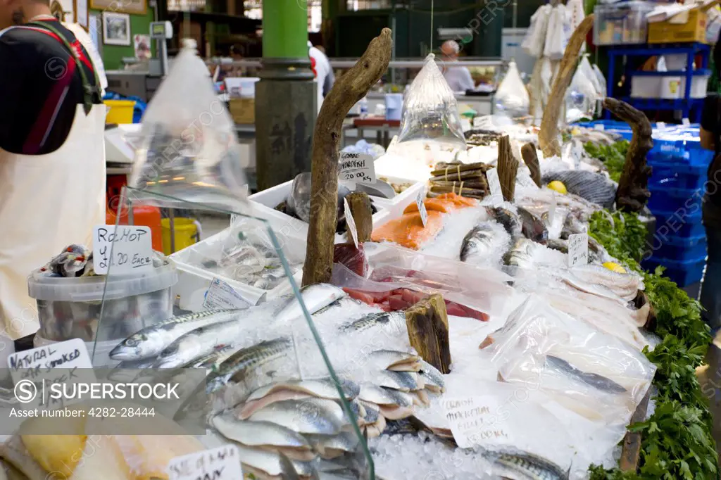 England, London, Bermondsey. Fresh fish for sale from a fishmongers stall in a market.