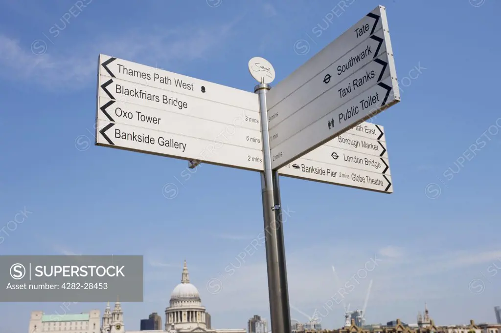 England, London, Southwark. A directional sign on the South Bank of the River Thames.