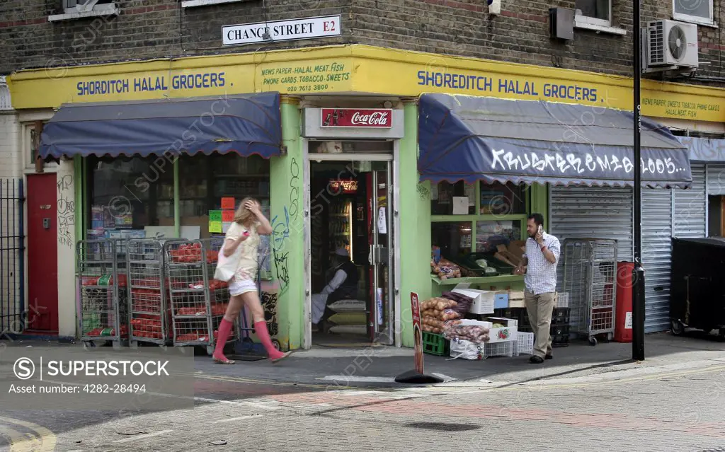 England, London, Shoreditch. Halal cornershop grocers in the East End.