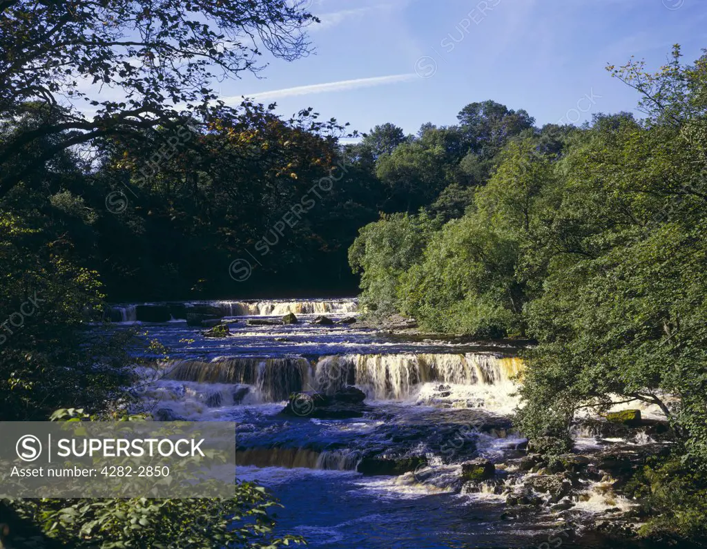 England, North Yorkshire, Aysgarth. The River Ure falls at Aysgarth.