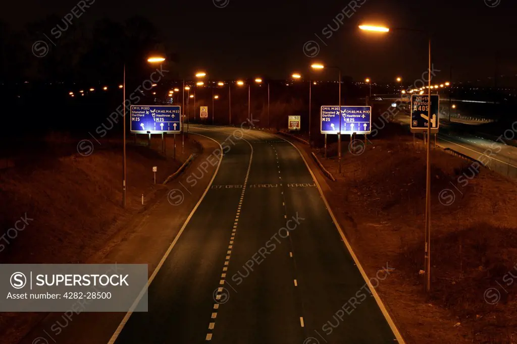 England, Hertfordshire, St Albans. The M1 motorway at night.