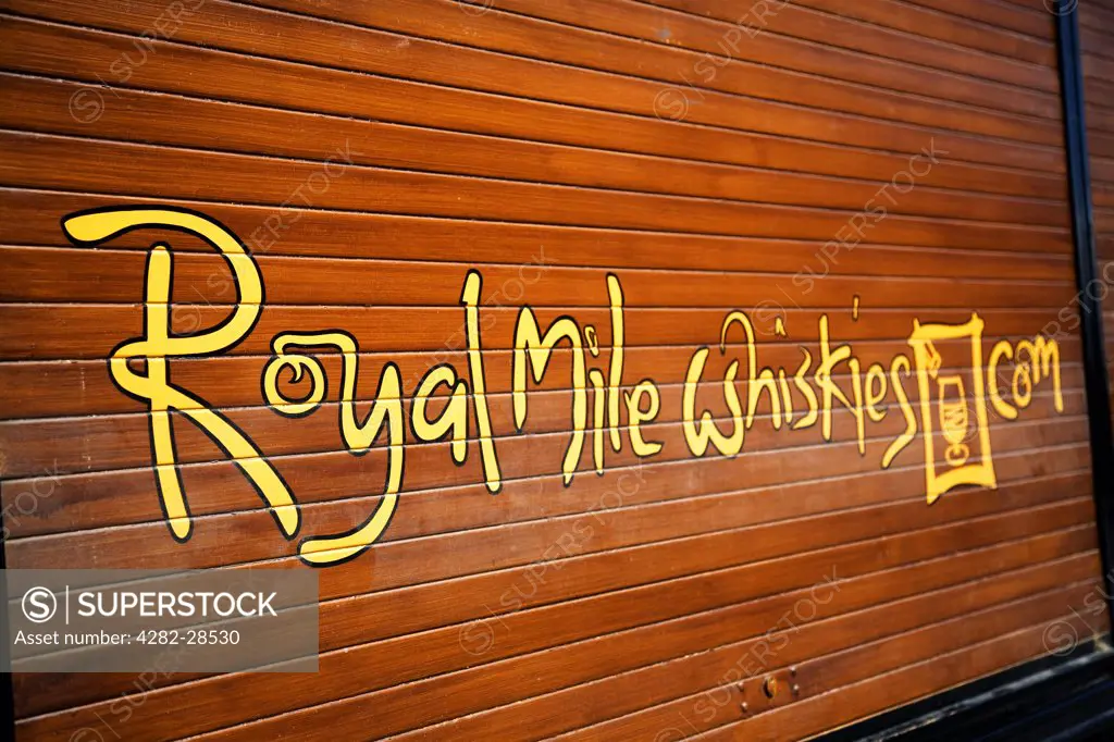 Scotland, Lothian, Edinburgh. Shutters advertising Royal Mile Whiskies.