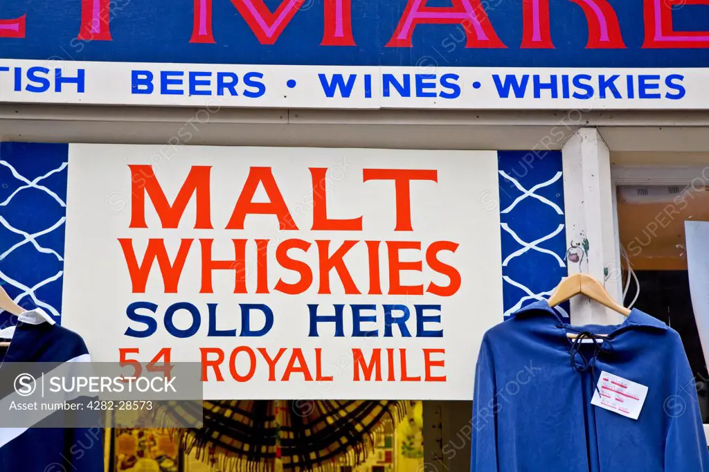 Scotland, Lothian, Edinburgh. Shop signage advertising malt whisky.