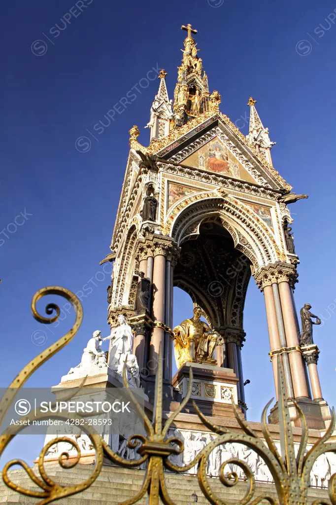 England, London, Kensington Gardens. The Albert Memorial in Kensington Gardens, created in 1872 in memory to Queen Victoria's husband who died of Typhoid fever at the age of 42.