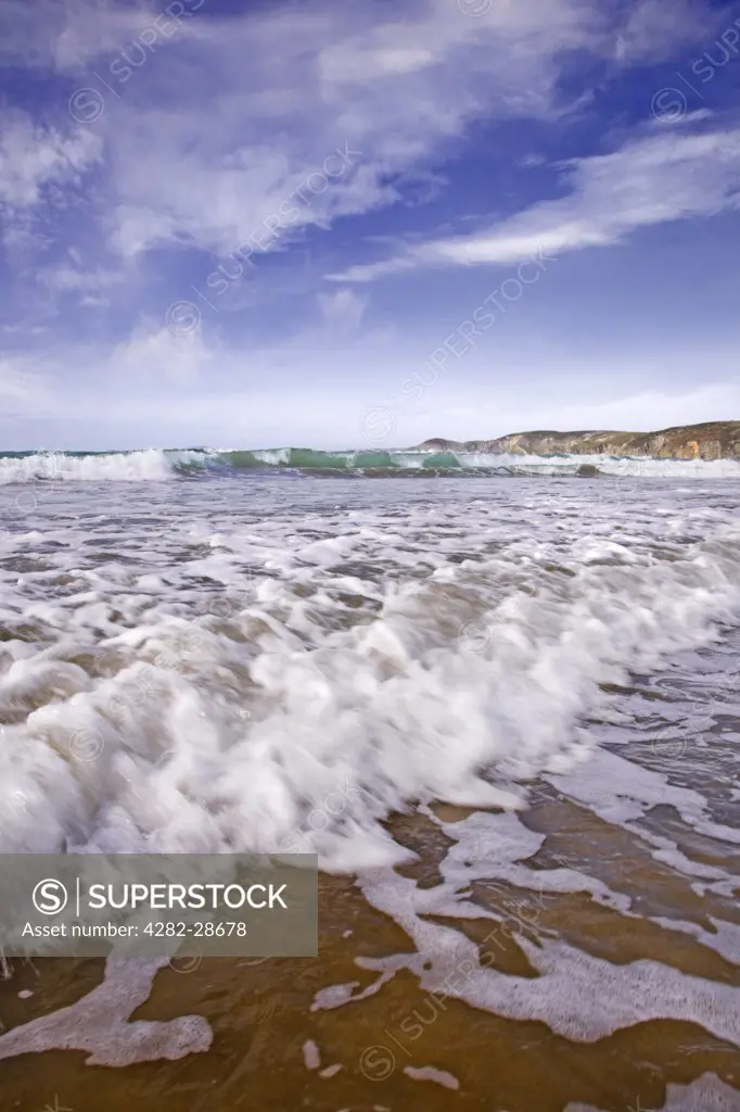 Wales, Pembrokeshire, Newgale. Waves rolling onto Newgale beach.