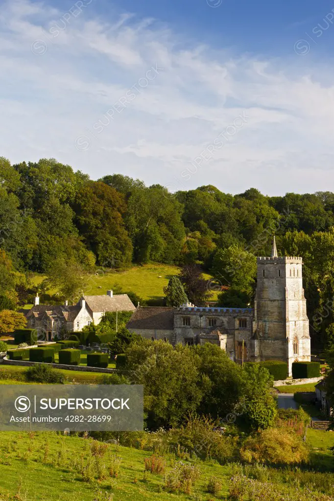 England, Gloucestershire, Hawkesbury. The Parish Church of St Mary the Virgin surrounded by rural countryside.